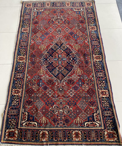 Antique Joshegan Rug